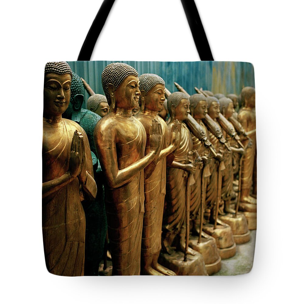 Buddha Tote Bag featuring the photograph Buddhist Symmetry In Bangkok by Shaun Higson