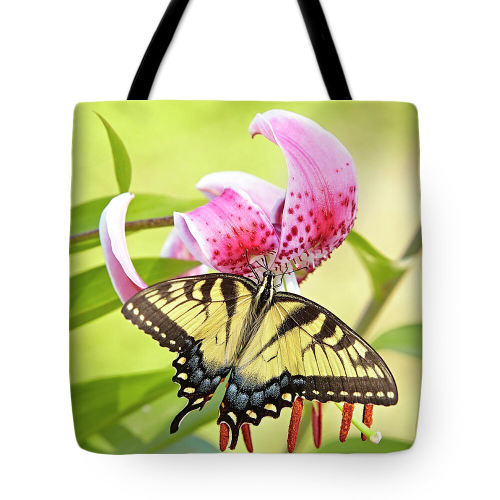 Butterfly Tote Bag featuring the photograph Butterfly and Lily by Garden Gate