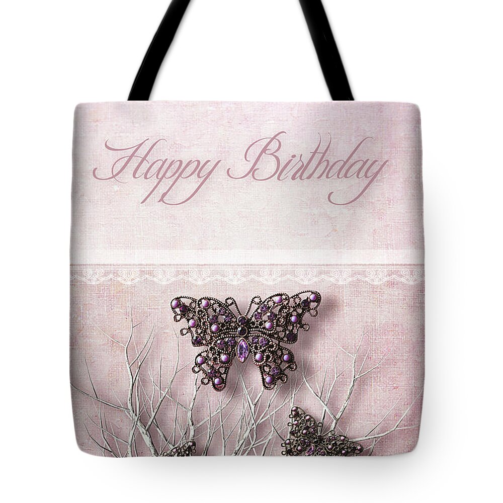  Floral Tote Bag featuring the photograph Butterfly pendants on branches by Sandra Cunningham