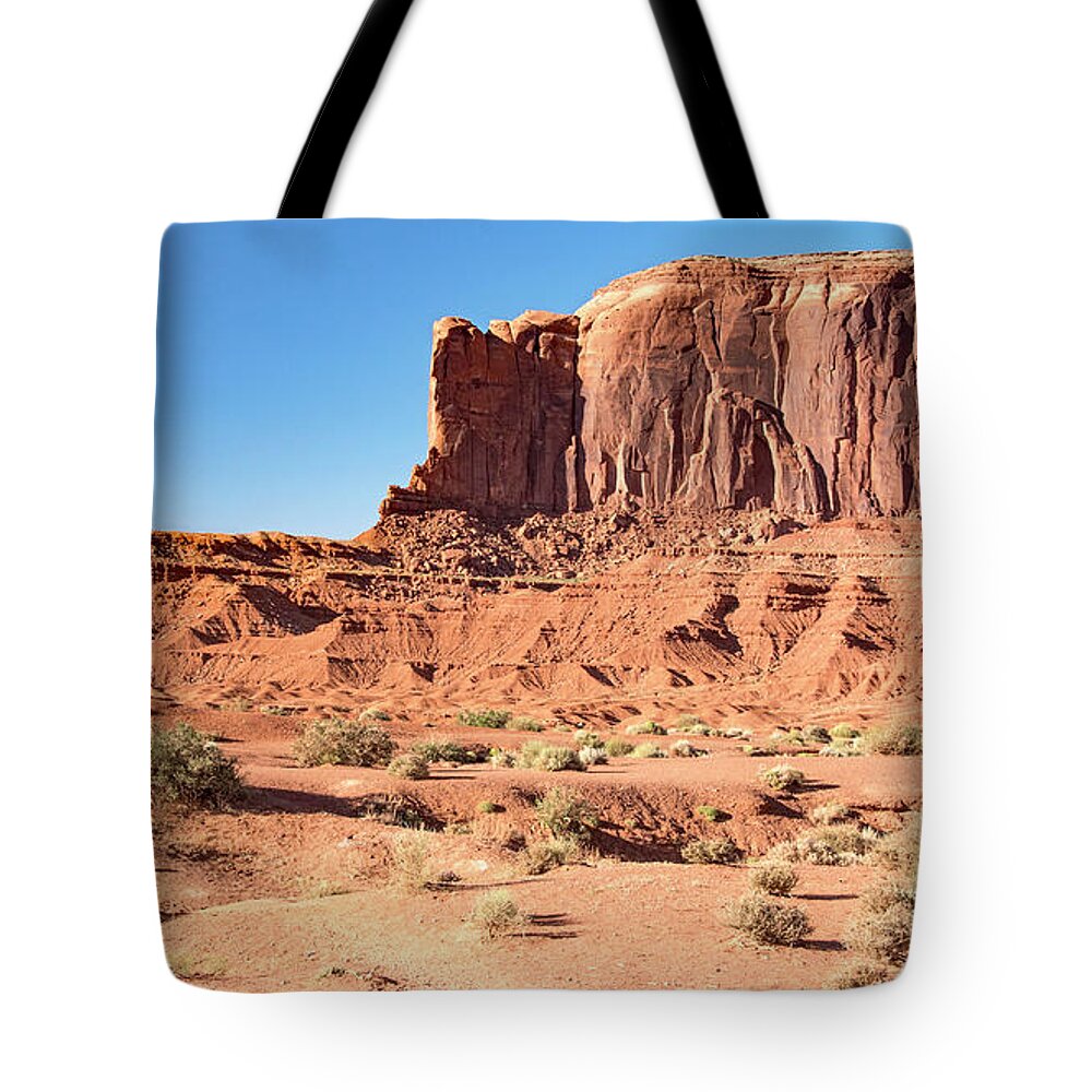 Butte Tote Bag featuring the photograph Buttes, Desert Floor, Monument Valley, Utah, Arizona Border by A Macarthur Gurmankin