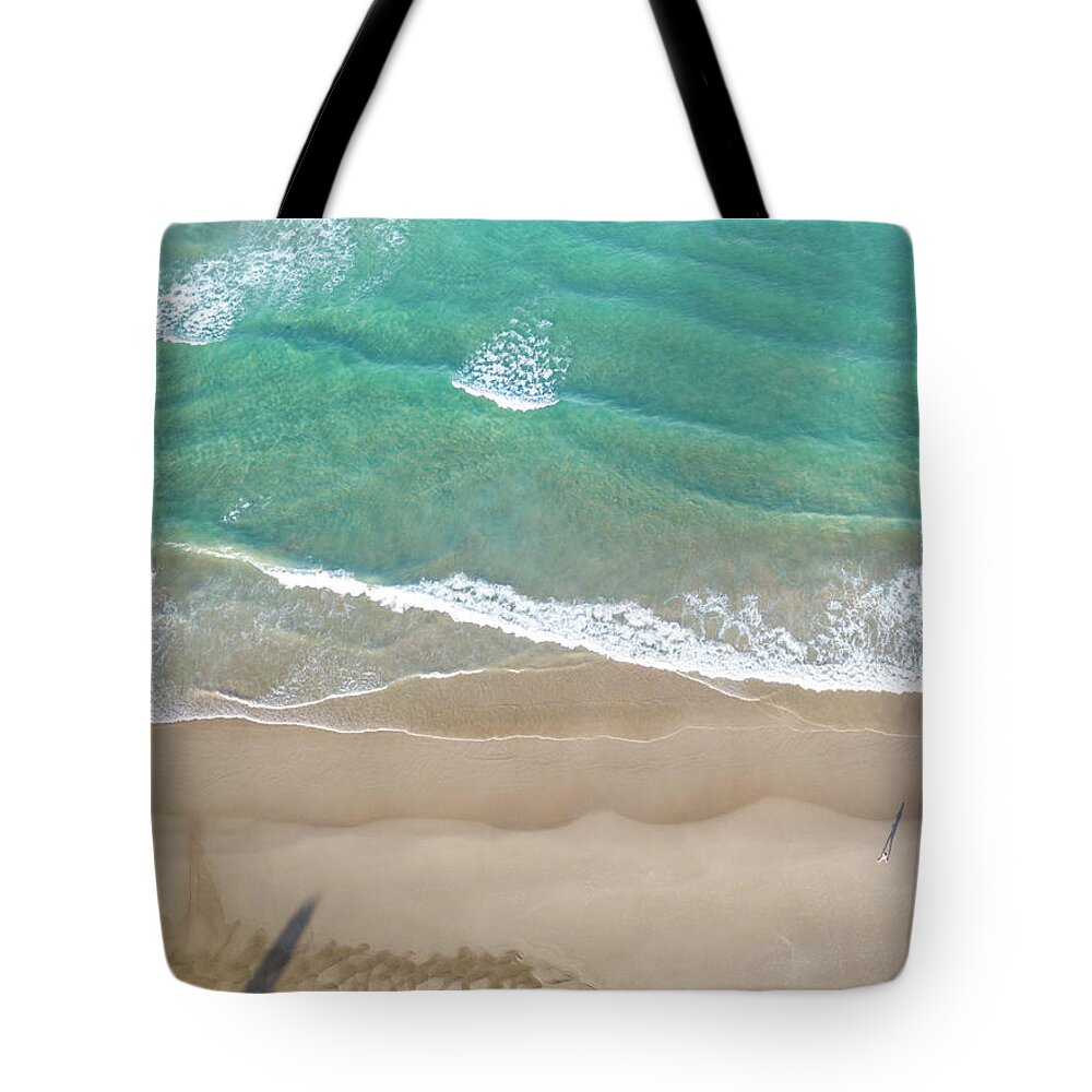 Chriscousins Tote Bag featuring the photograph Byron Beach Life by Chris Cousins