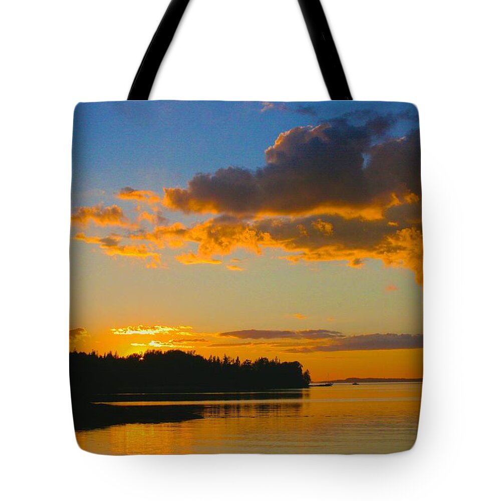  Tote Bag featuring the photograph Calm as the Sun Goes Down by Polly Castor