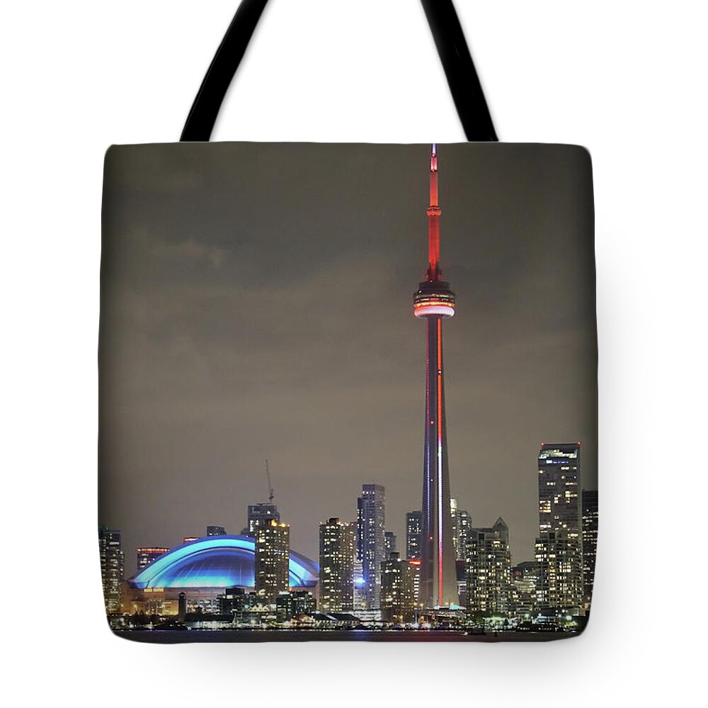 The Cn Tower Is The Biggest Landmark In Toronto Tote Bag featuring the photograph Toronto Skyline #1 by Nick Mares