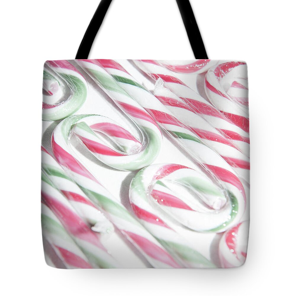 Helen Northcott Tote Bag featuring the photograph Candy Cane Swirls by Helen Jackson