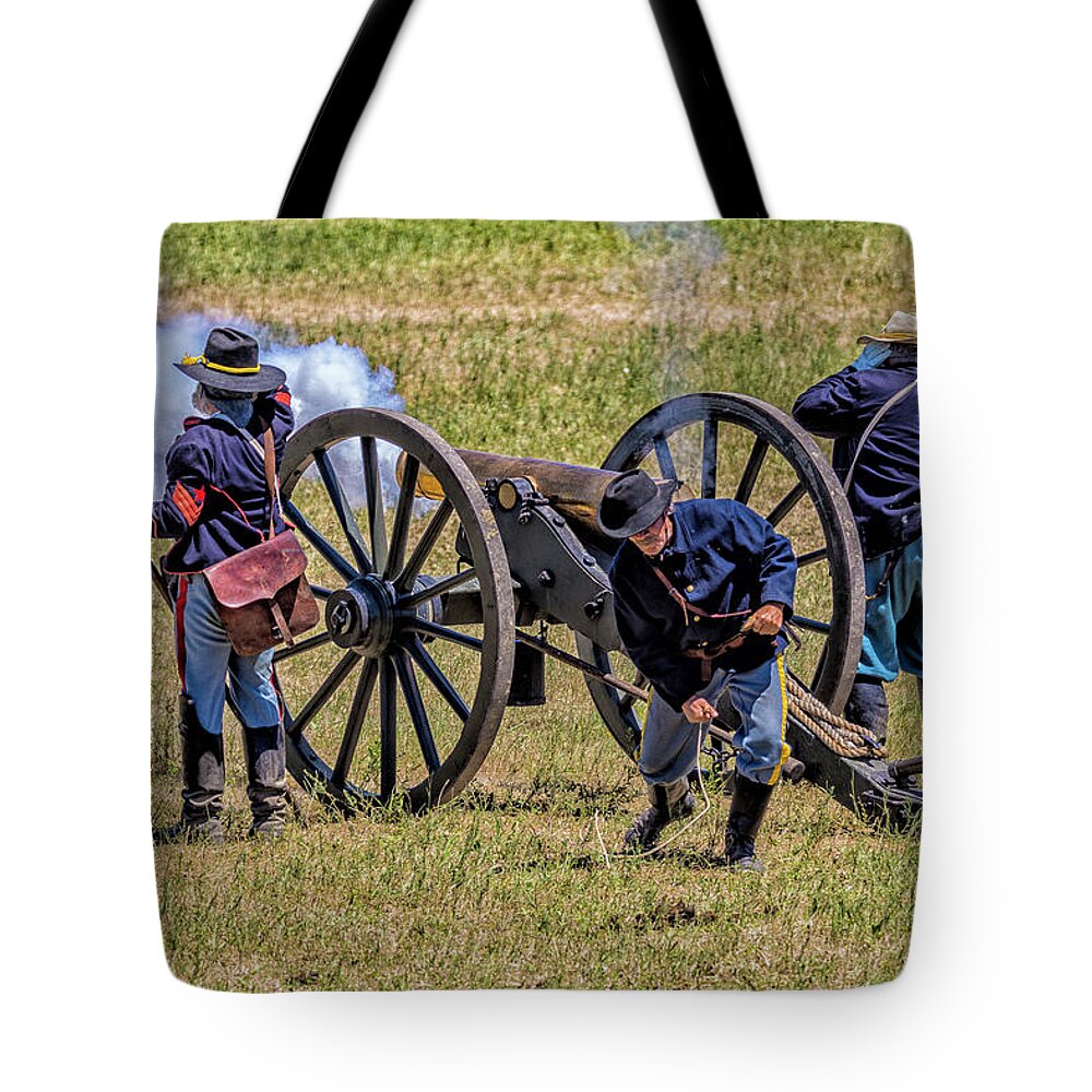 Little Bighorn Re-enactment Tote Bag featuring the photograph Cannon Fired Across Little Bighorn River by Donald Pash