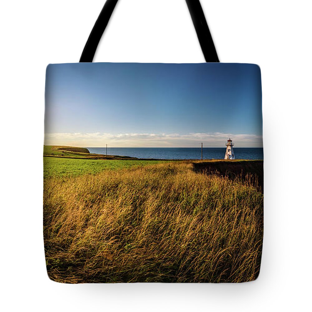 Cape Tryon Light Tote Bag featuring the photograph Cape Tryon Lighthouse Sunset by Chris Bordeleau