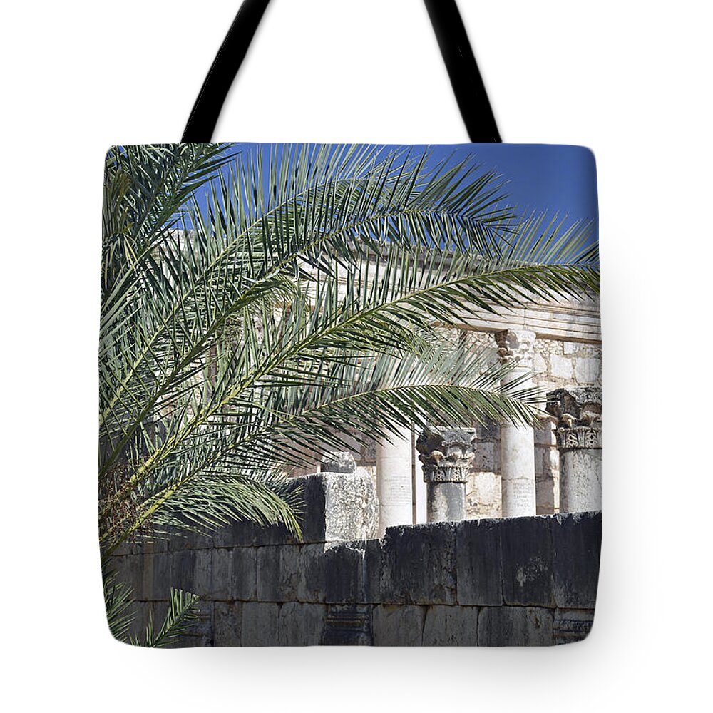 Israel Tote Bag featuring the photograph Caperaum Synagogue Ruins in Israel by Bruce Gourley