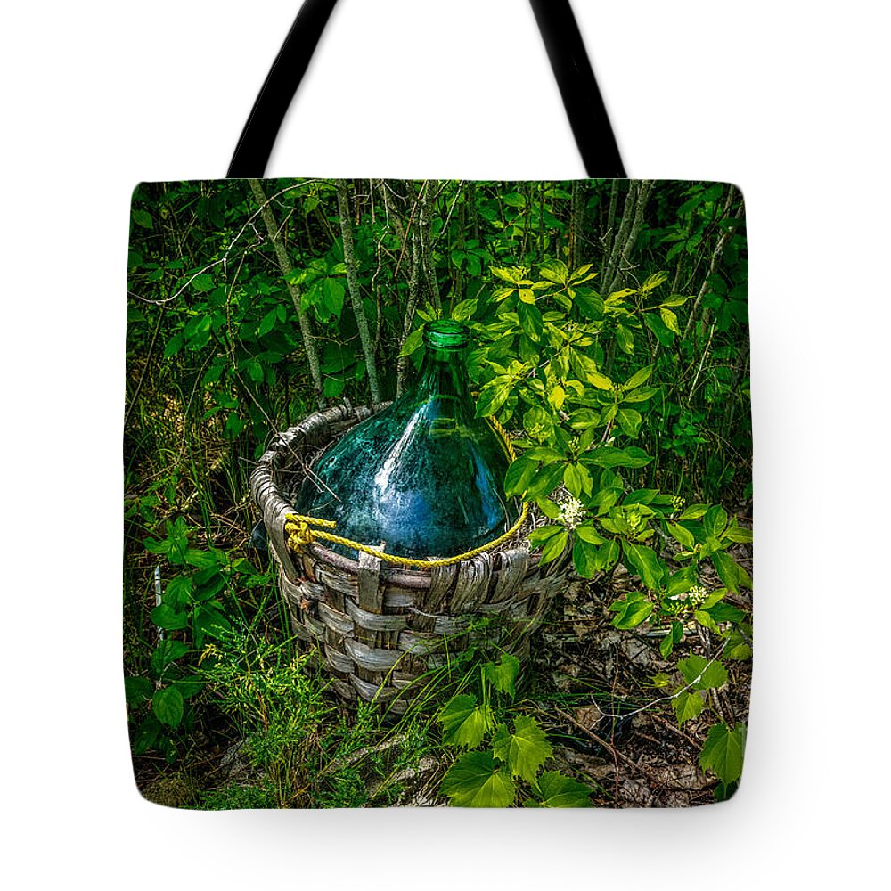 Abandoned Tote Bag featuring the photograph Carboy in a Basket by Roger Monahan