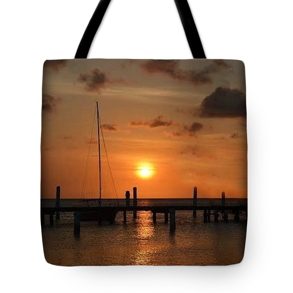 Sunset Tote Bag featuring the photograph Caribbean Sunset by Carolyn Mickulas