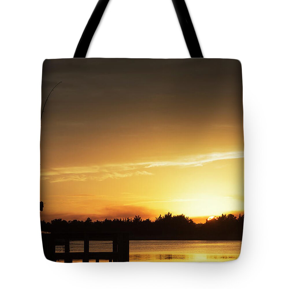  Tote Bag featuring the photograph Catching The Sunset by Phil Mancuso