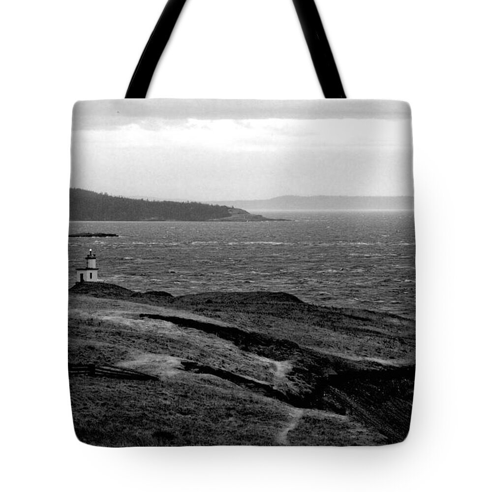 Lighthouse Tote Bag featuring the photograph Cattle Point Lighthouse by Joseph Noonan