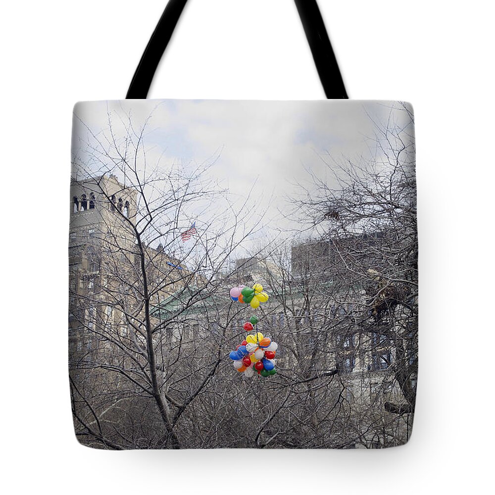 New York Tote Bag featuring the photograph Caught in the trees in NYC by Erik Burg