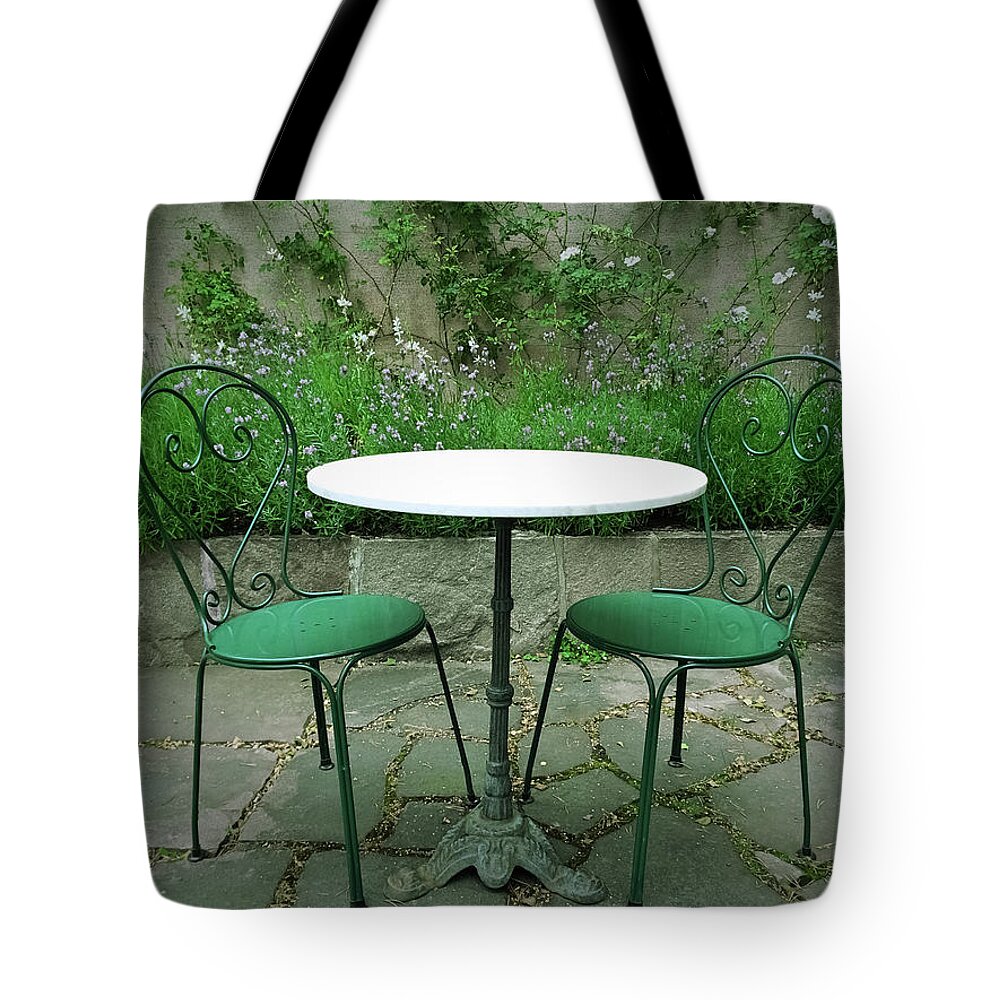 Chair Tote Bag featuring the photograph Chairs and table in a magic summer garden by GoodMood Art