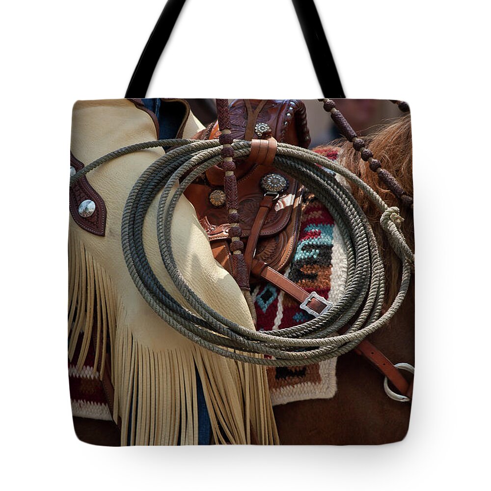 Rodeo Tote Bag featuring the photograph Chaps and Rope by Roger Mullenhour