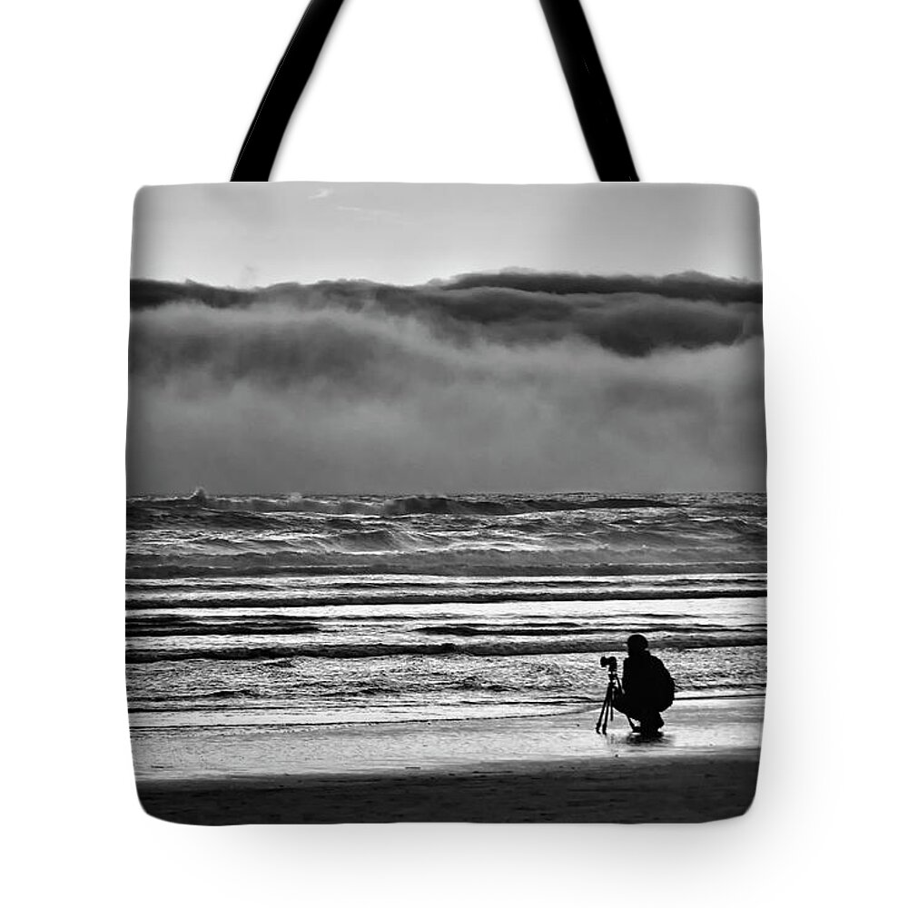 Cannon Beach Tote Bag featuring the photograph Chasing Tide and Light by Steven Clark