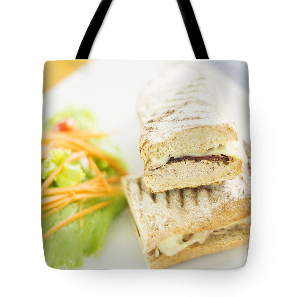 Baguette Tote Bag featuring the photograph Cheese Tuna And Sundried Tomato Toasted Baguette by JM Travel Photography