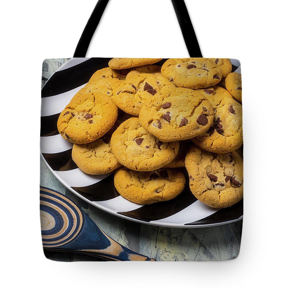 Pile Tote Bag featuring the photograph Chocolate Chip Cookies On Striped Plate by Garry Gay