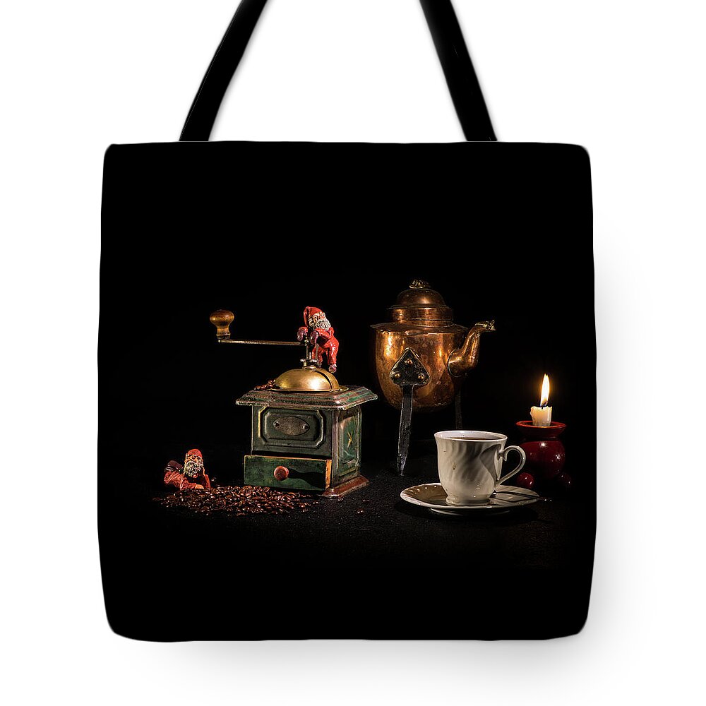 Candlelight Tote Bag featuring the photograph Christmas Coffee-time by Torbjorn Swenelius