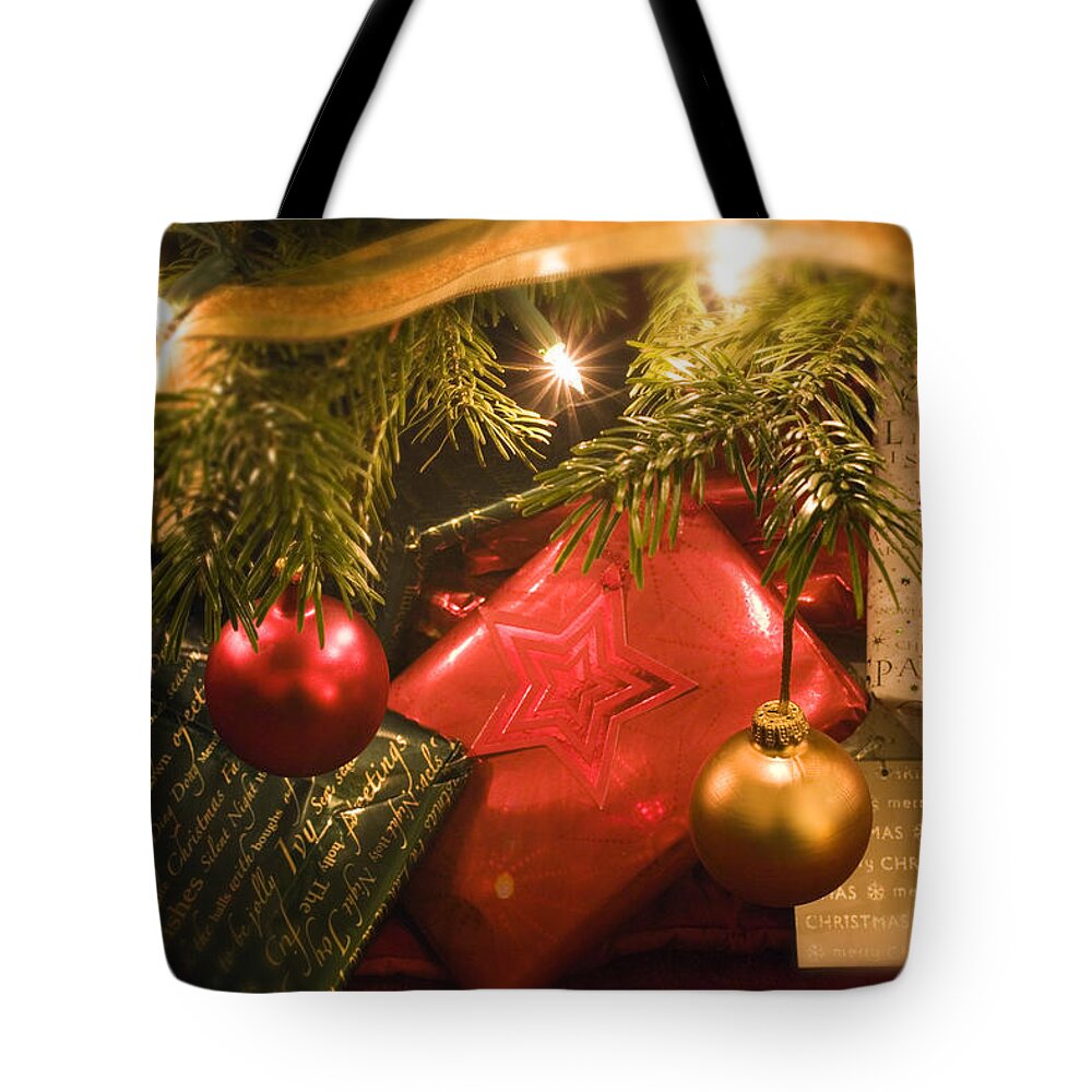 Christmas Tote Bag featuring the photograph Christmas Tree Decorations and Gifts by Mal Bray