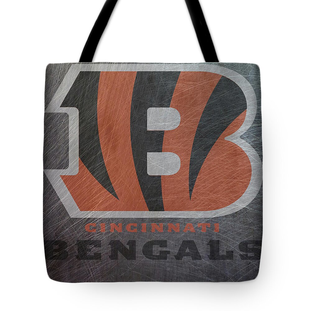 Cincinnati Tote Bag featuring the mixed media Cincinnati Bengals Translucent Steel by Movie Poster Prints