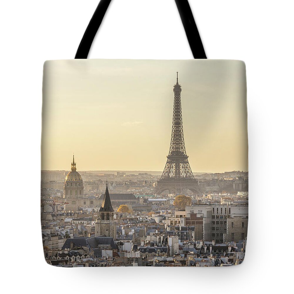 Paris Tote Bag featuring the photograph City of Paris and tour Eiffel at sunset, Ile de France, France by Matteo Colombo