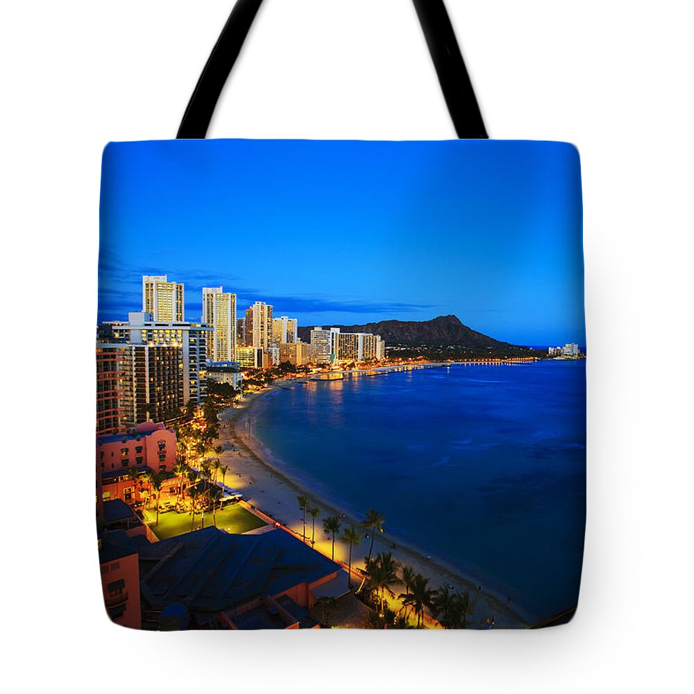 Above Tote Bag featuring the photograph Classic Waikiki Nightime by Tomas del Amo - Printscapes