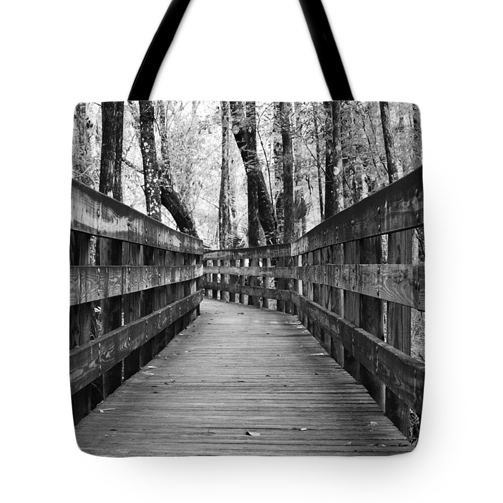 Black And White Tote Bag featuring the photograph Closing In by Melanie Moraga
