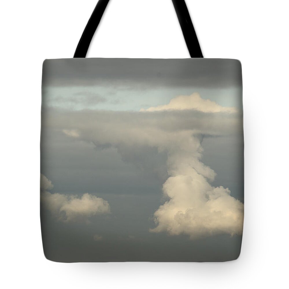 Sky Tote Bag featuring the photograph Cloud Breaks Through Cloud by Adrian Wale