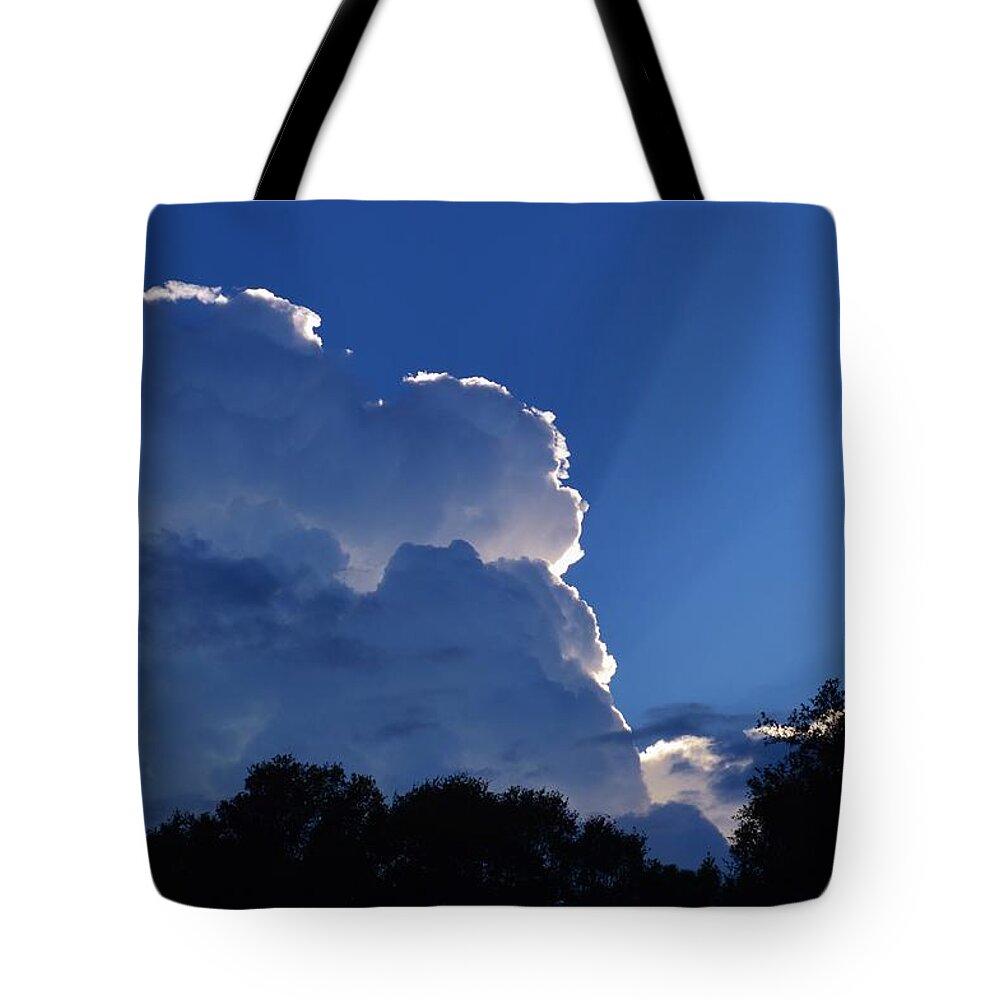 Cloud Highlights Tote Bag featuring the photograph Cloud Highlights by Warren Thompson