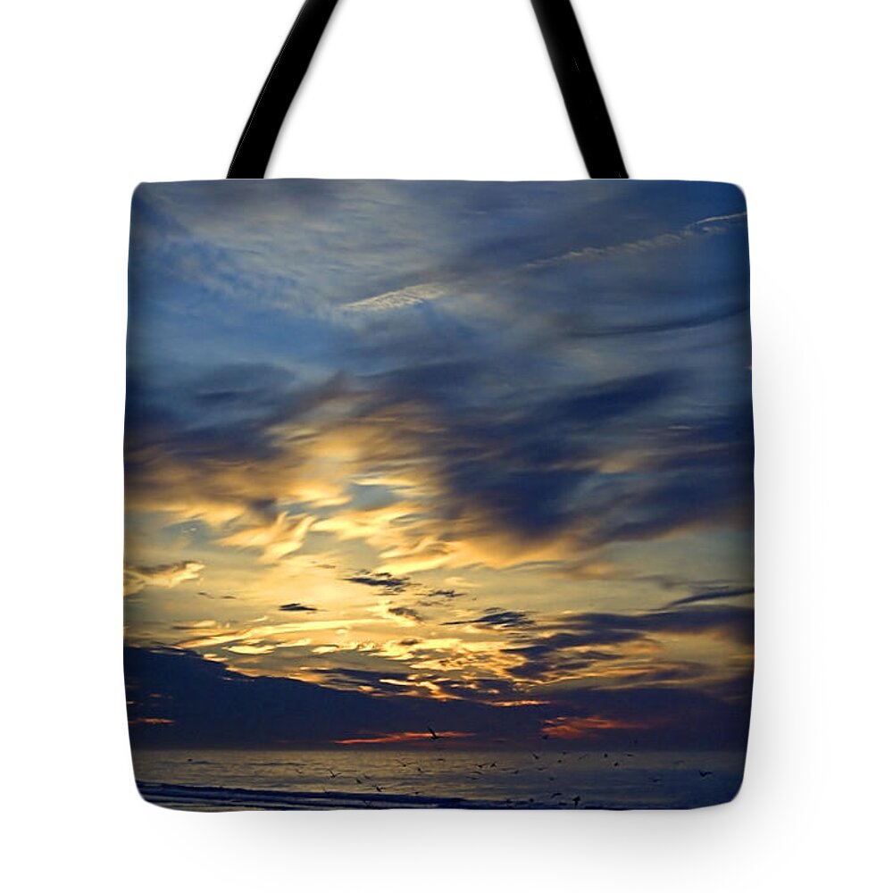 Clouded Sunrise Tote Bag featuring the photograph Clouded Sunrise by Newwwman