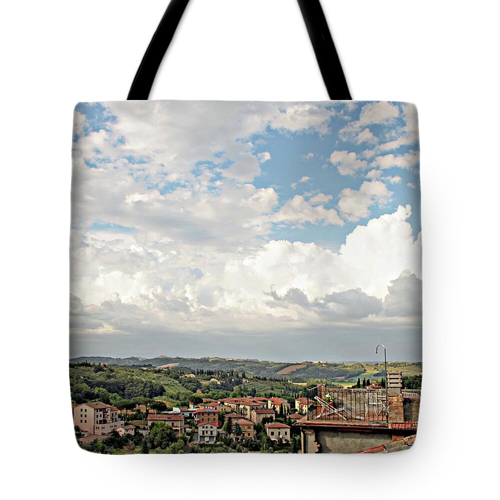 Tuscany Tote Bag featuring the photograph Clouds above me by Jacci Freimond Rudling