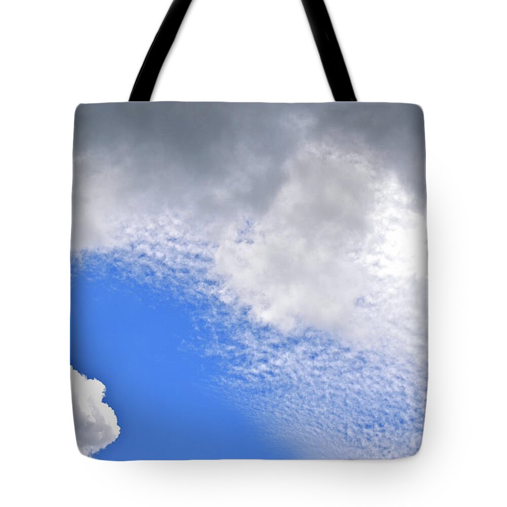 Clouds Tote Bag featuring the photograph Clouds and Blue Skies by Tara Potts