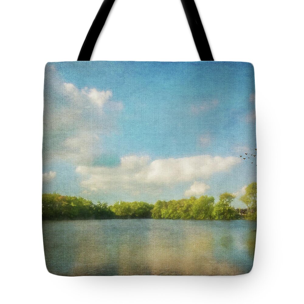 Clouds Tote Bag featuring the photograph Clouds Over The Lake by Cathy Kovarik