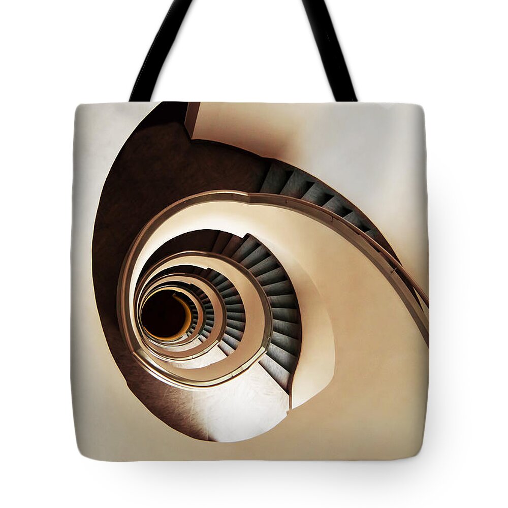 Architecture Tote Bag featuring the photograph Coffee and milk spiral staircase by Jaroslaw Blaminsky
