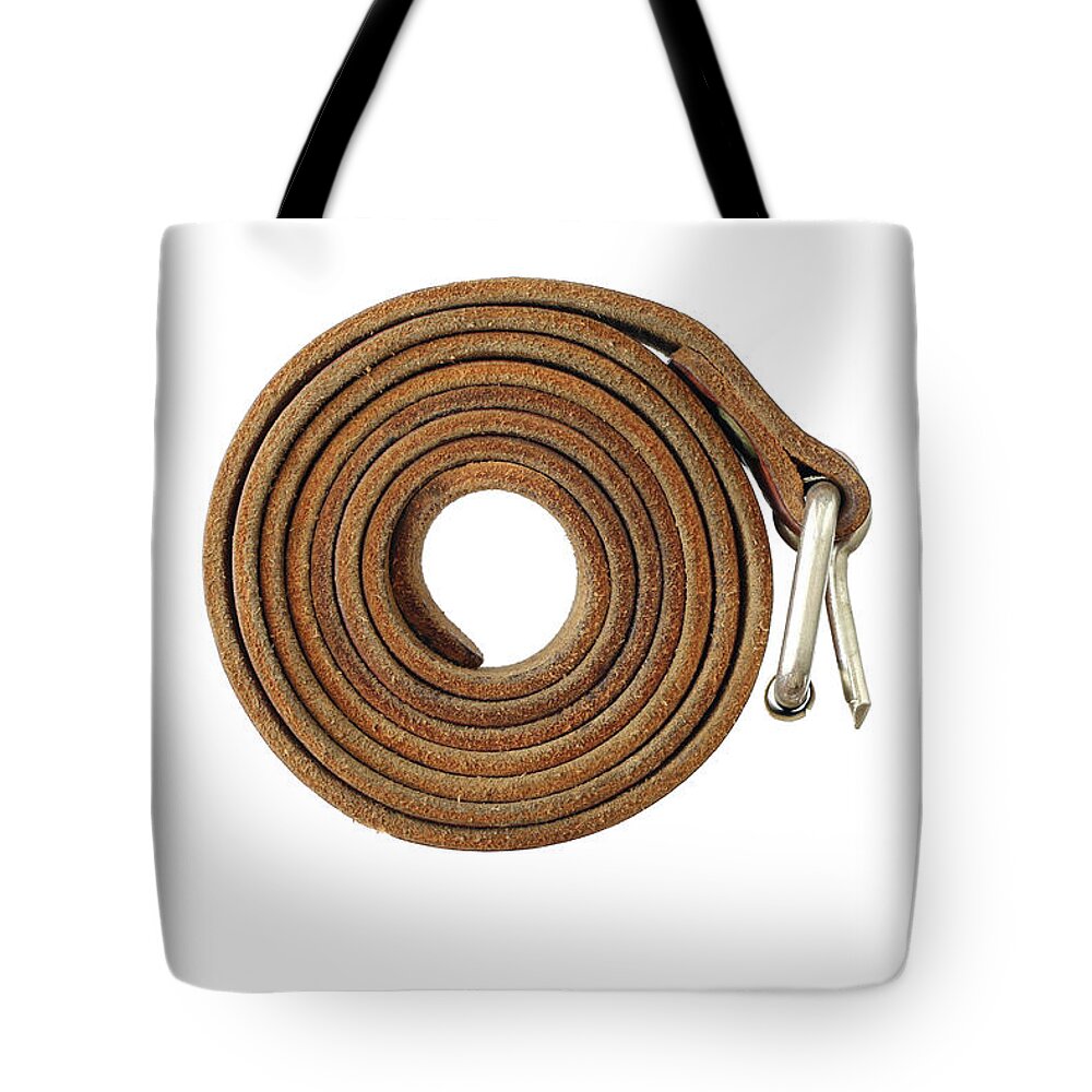 Coiled Tote Bag featuring the photograph Coiled leather belt on a white background by Michal Boubin