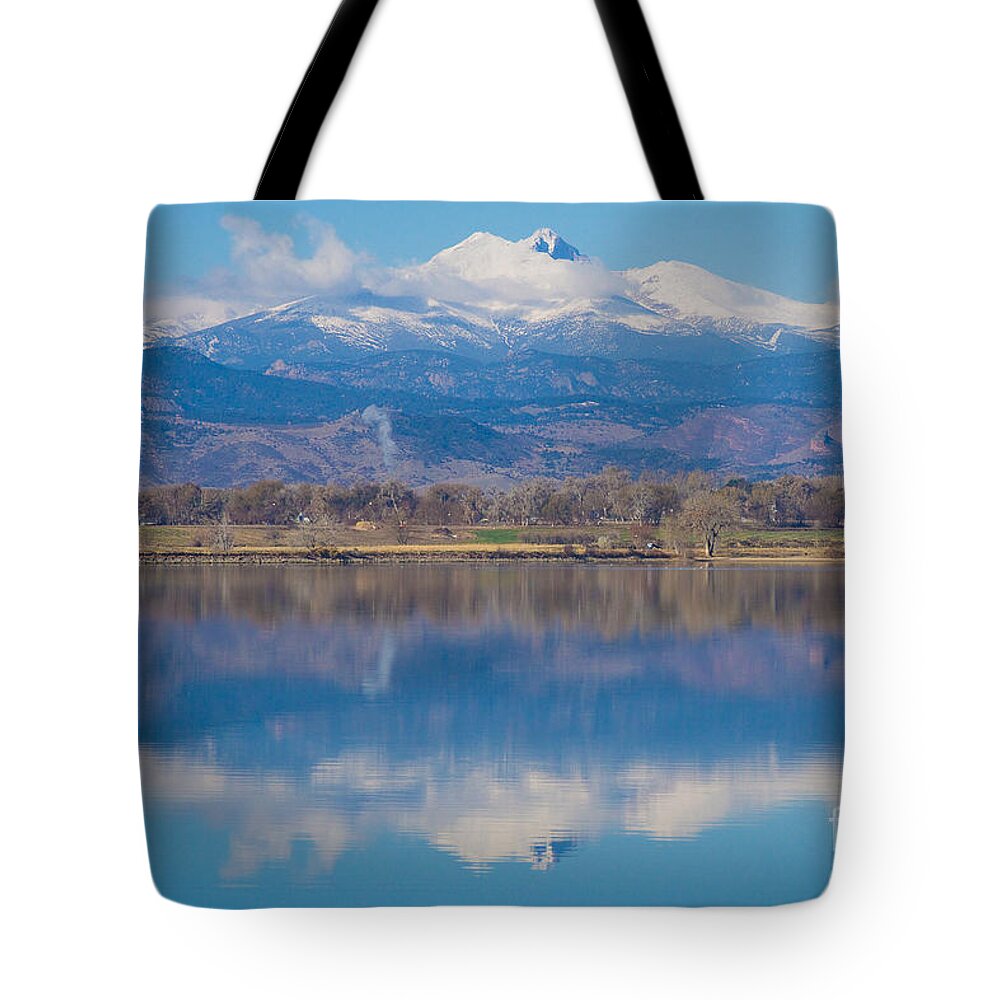 'longs Peak' Longs Peak Co' Tote Bag featuring the photograph Colorado Longs Peak Circling Clouds Reflection by James BO Insogna
