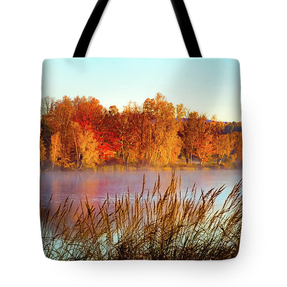 #jefffolger Tote Bag featuring the photograph Colorful dawn on Haley Pond by Jeff Folger