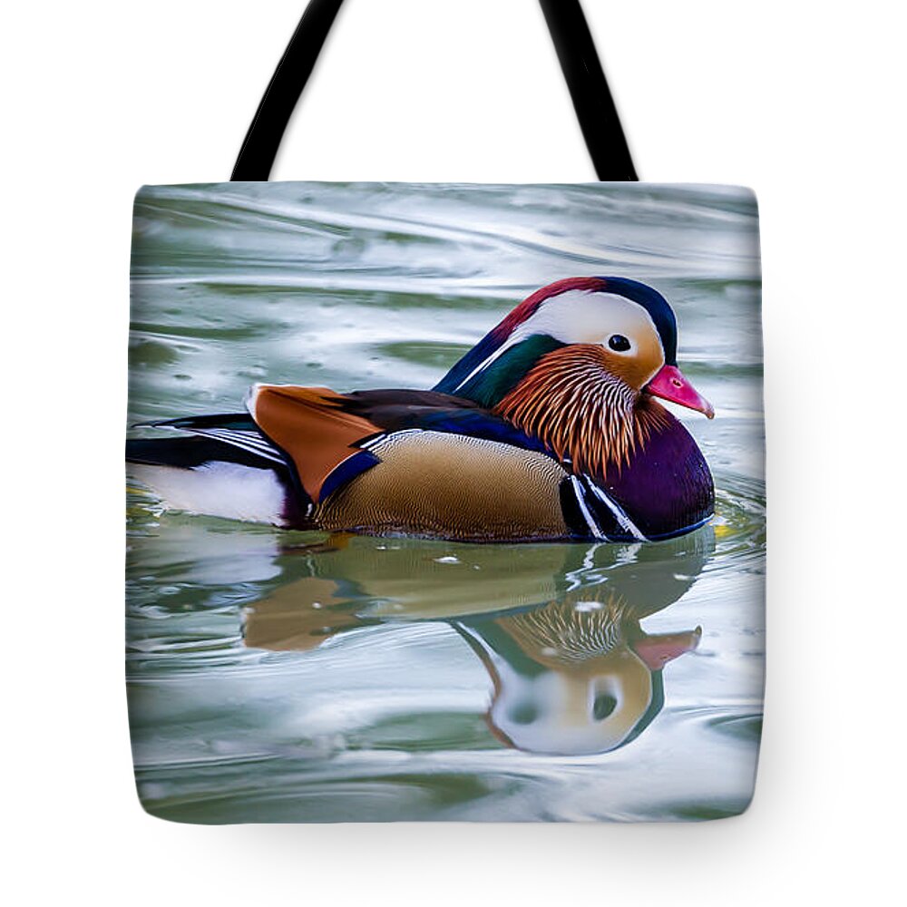 Colorful Tote Bag featuring the photograph Colorful by Torbjorn Swenelius