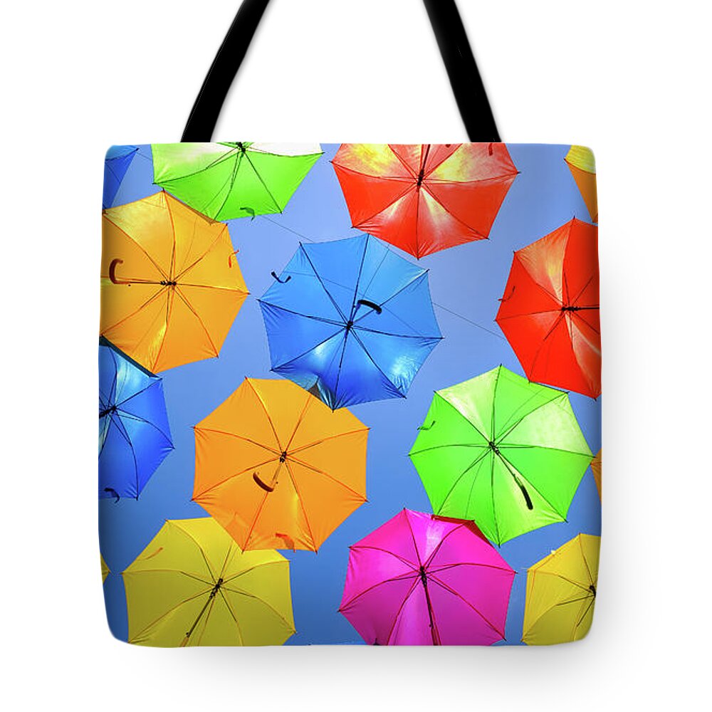 Umbrellas Tote Bag featuring the photograph Colorful Umbrellas I by Raul Rodriguez