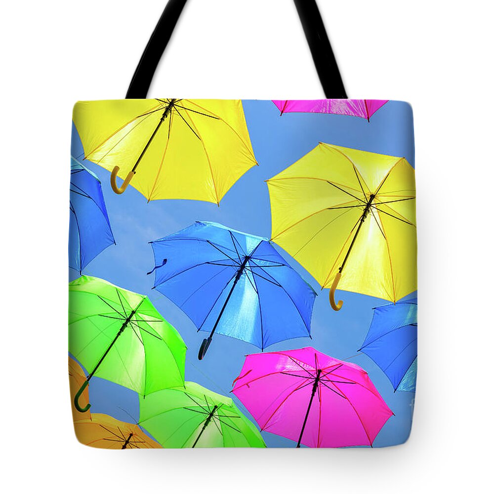 Umbrellas Tote Bag featuring the photograph Colorful Umbrellas III by Raul Rodriguez