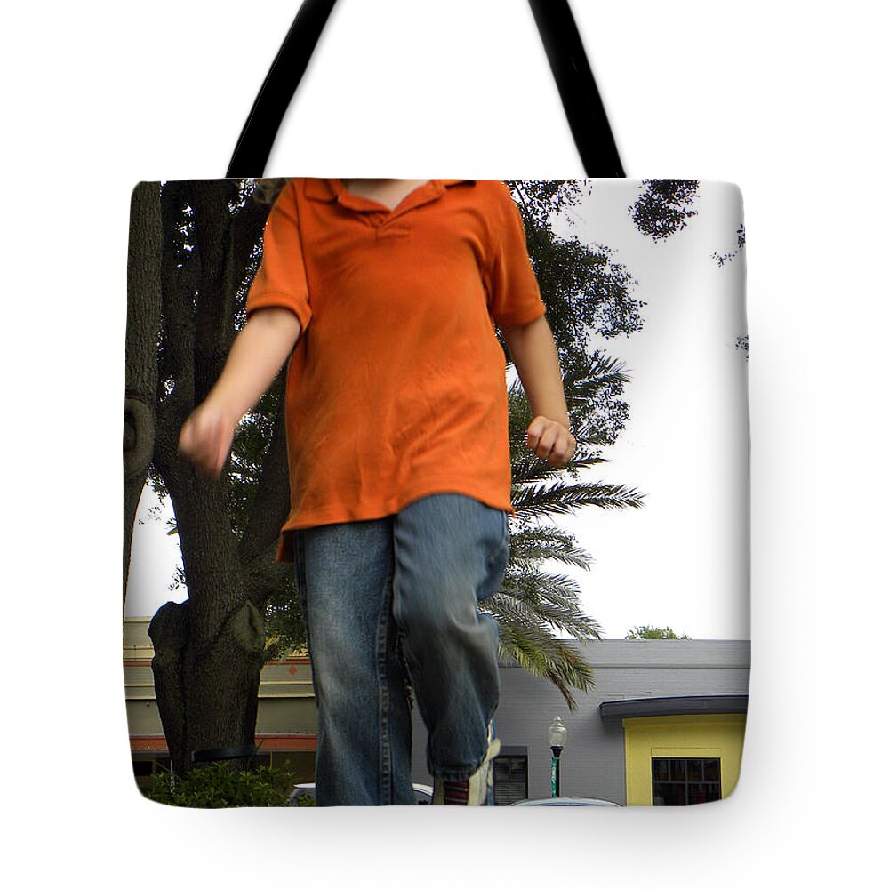 Auburndale Florida City Park Tote Bag featuring the photograph Coming Through by Christopher Mercer