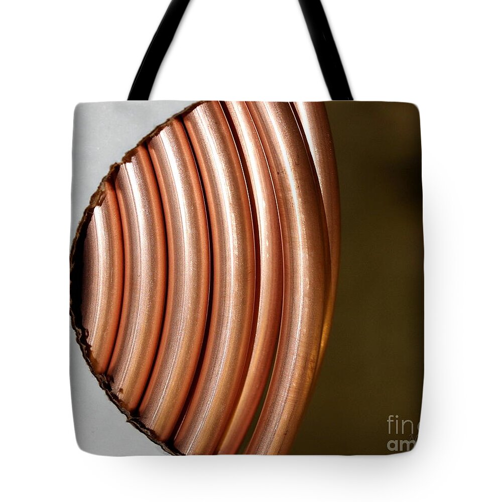 Copper Tubing In A Package. Tote Bag featuring the photograph Copper Curves by Natalie Dowty