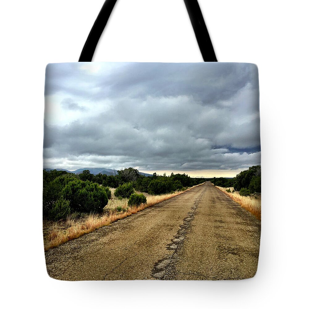 Road Tote Bag featuring the photograph County Road by Brad Hodges