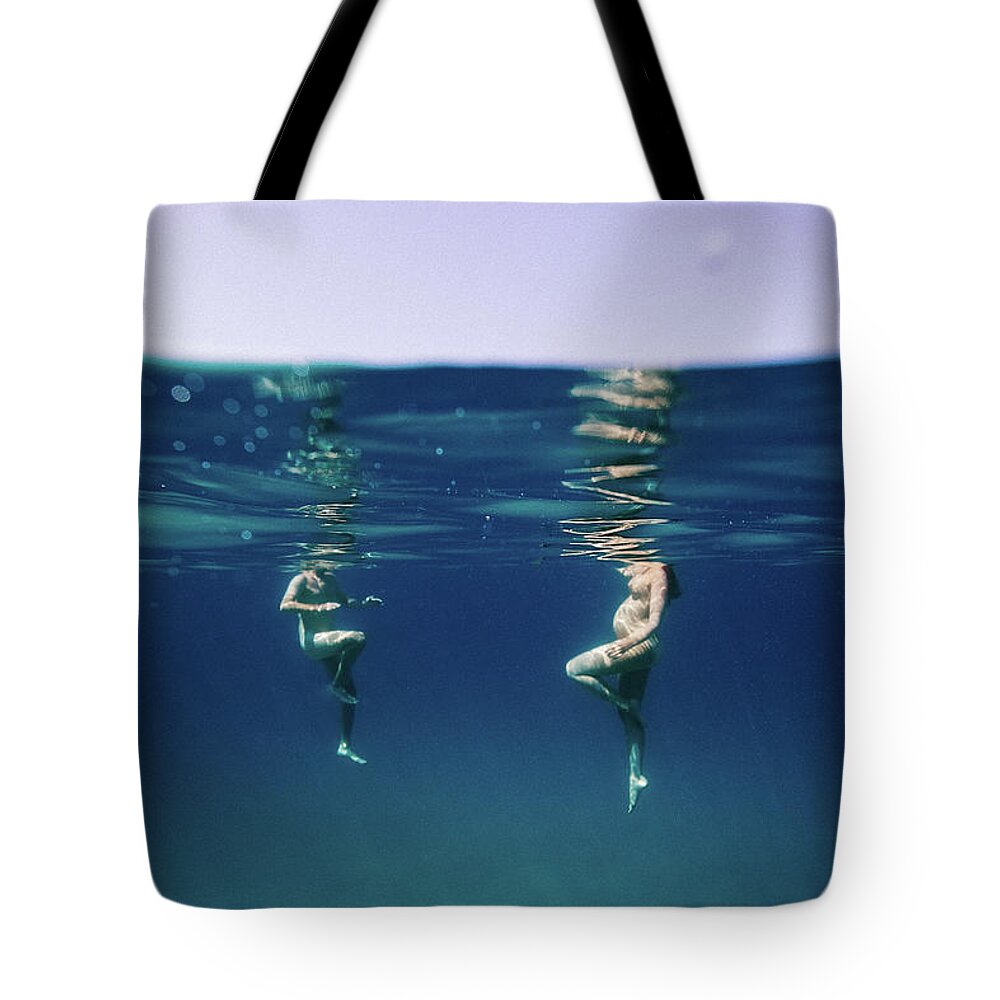 Swim Tote Bag featuring the photograph Couple of three by Gemma Silvestre