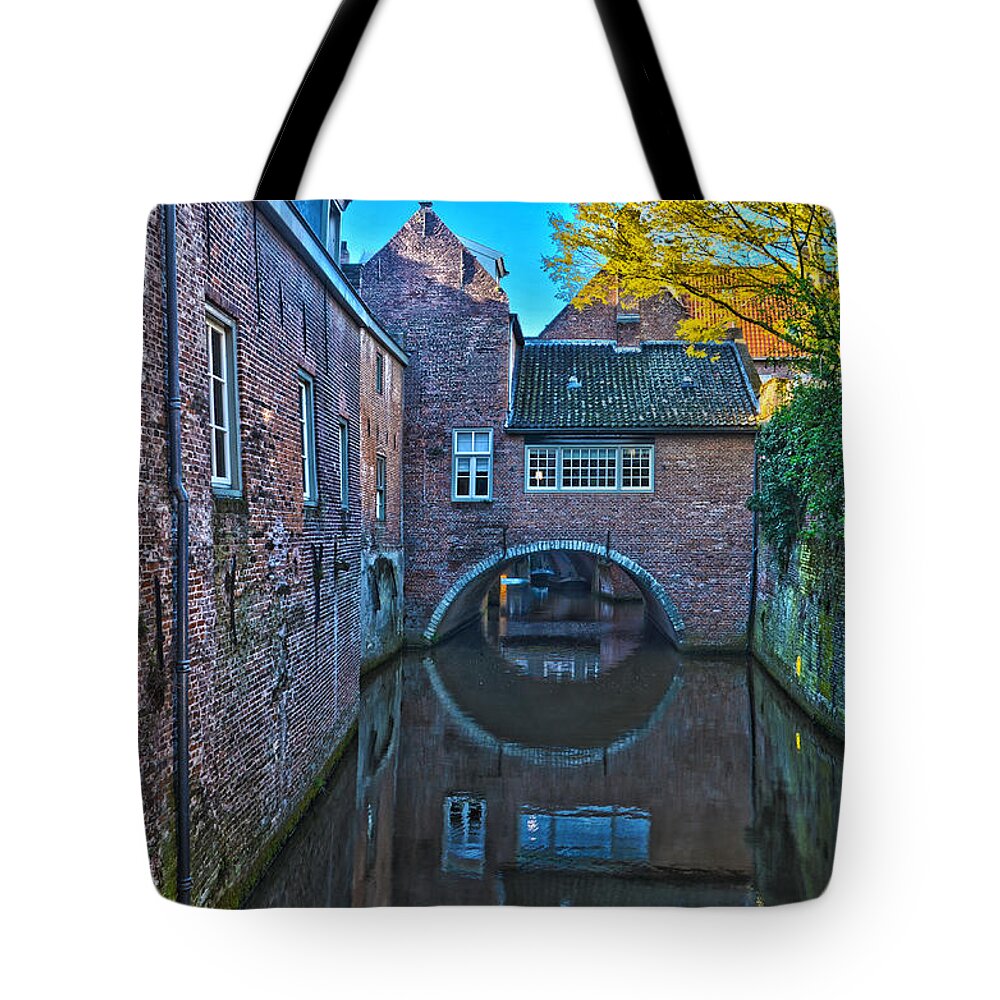 Netherlands Tote Bag featuring the photograph Covered Canal in Den Bosch by Frans Blok