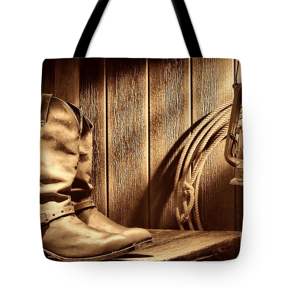 Boots Tote Bag featuring the photograph Cowboy Boots in Old Barn by American West Legend By Olivier Le Queinec