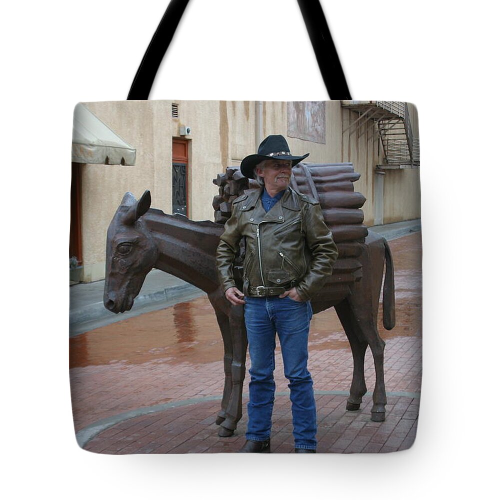 Cowboy Larry Tote Bag featuring the painting Cowboy Larry and his burro Santa Fe New Mexico by Imagery-at- Work