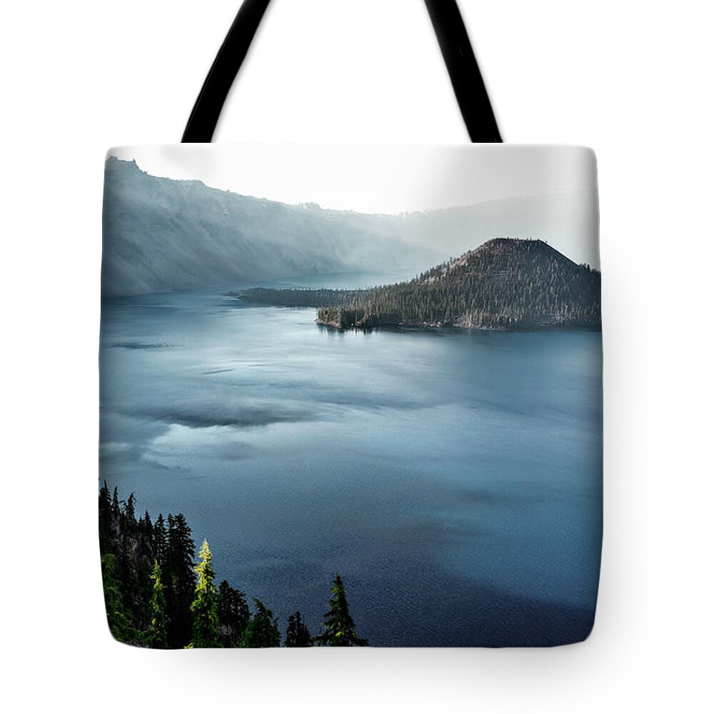 America Tote Bag featuring the photograph Crater Lake under a siege by Eduard Moldoveanu
