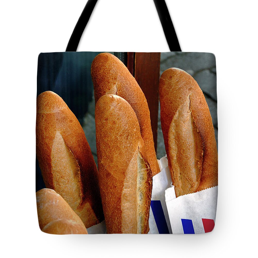 French Bread Tote Bag featuring the photograph Crusty French Bread Loaves Display at Bakery Entrance by Phil Cardamone