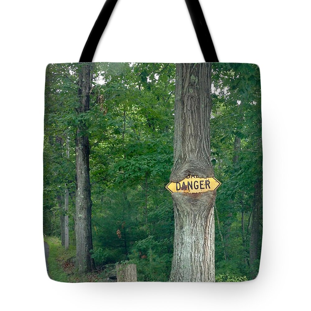 Tree Tote Bag featuring the photograph Danger - Sign-Eating Tree Ahead by Jason Freedman